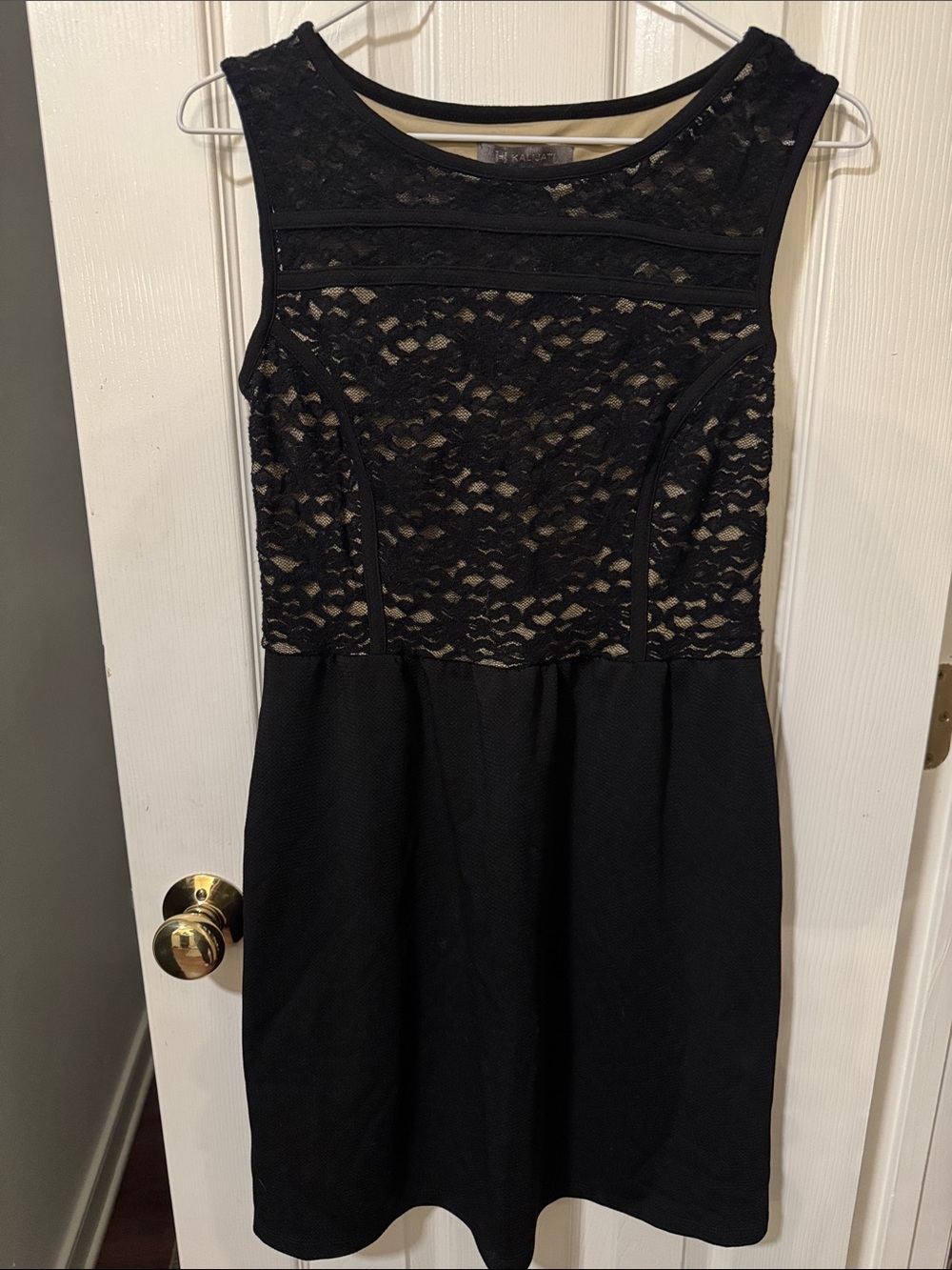 Sleeveless Black Lace Mini Dress with Skater Skirt